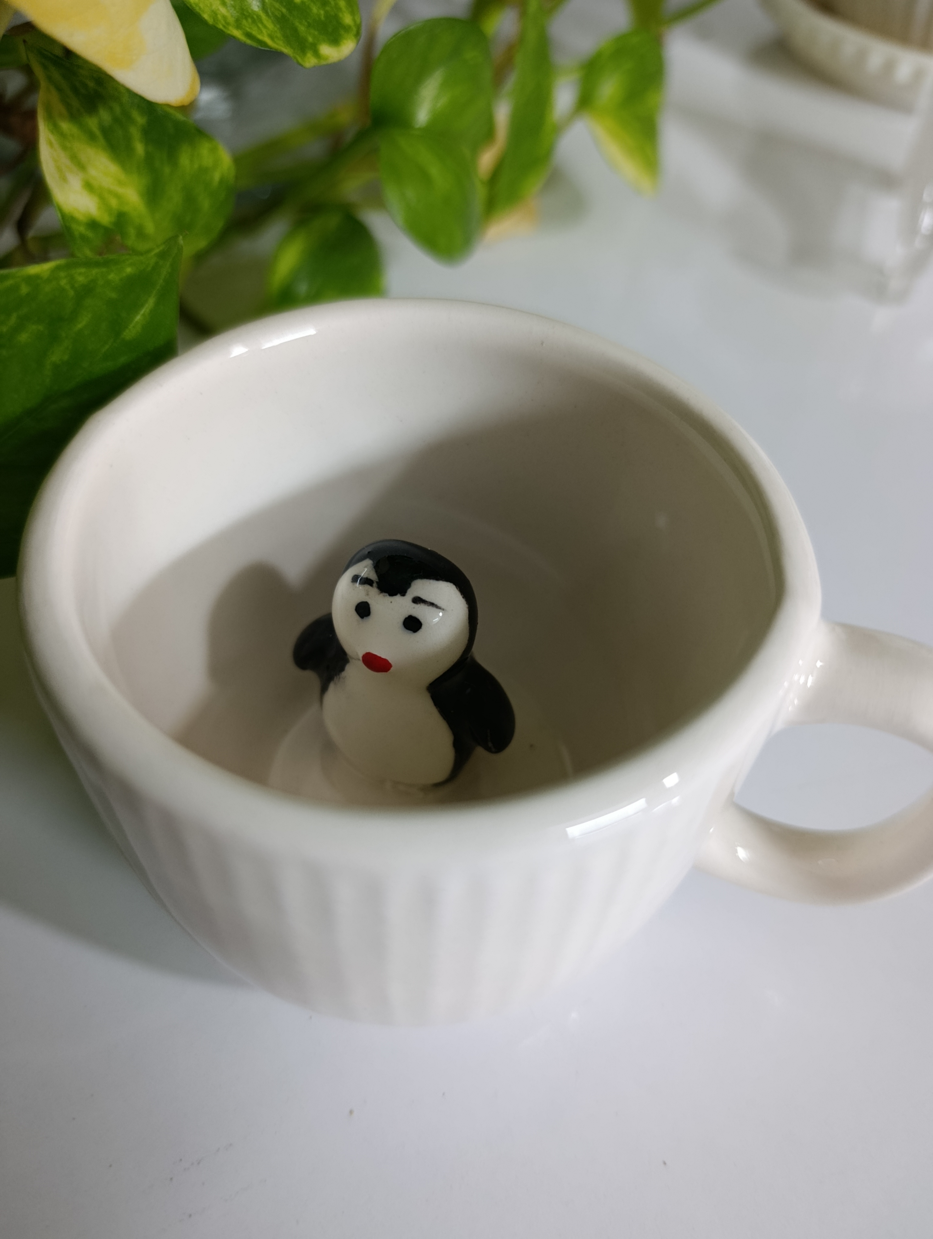 فنجان پنگوئن شناور